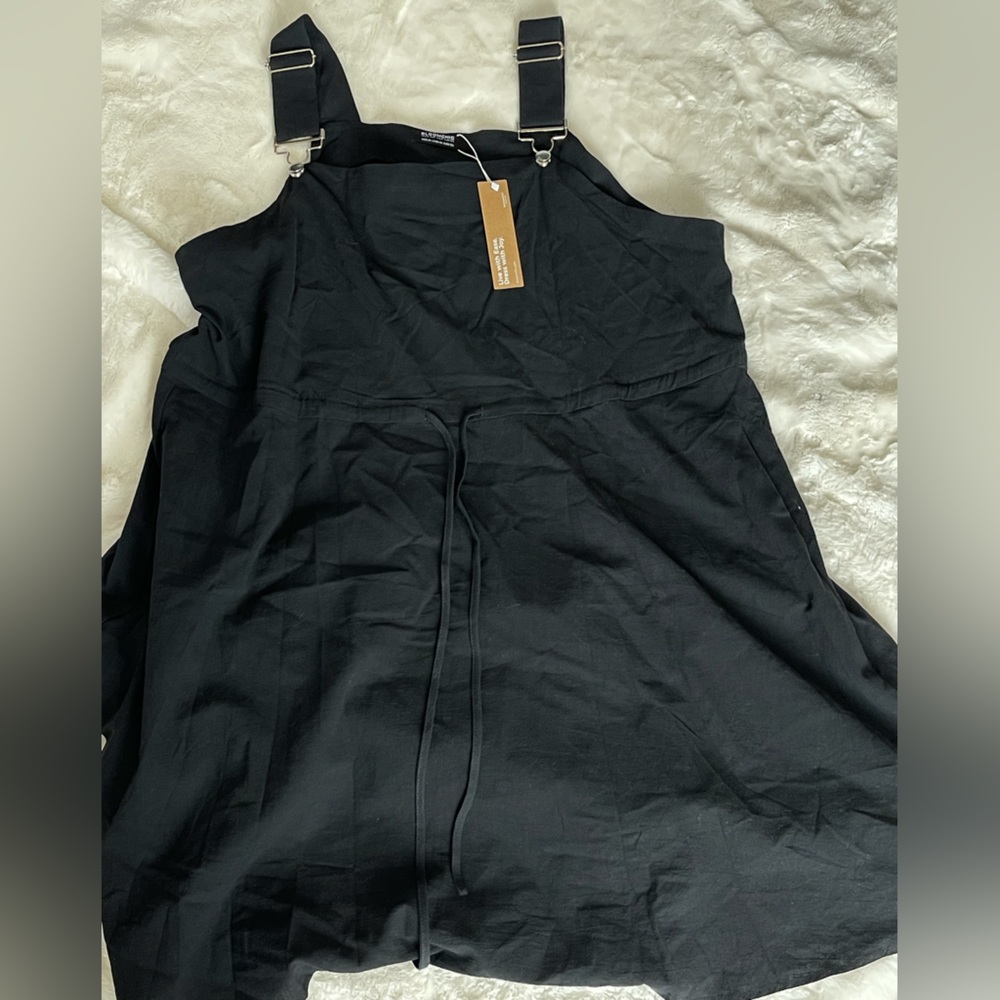 Black overall dress with drawstring waist